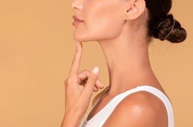 A profile shot of a woman's jaw after KYBELLA in San Antonio