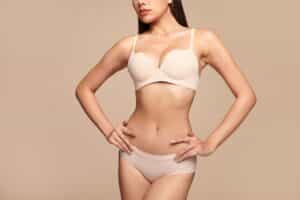 Cropped shot of a woman's body after body contouring after weight loss